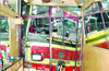 Bus barges into saloon to avoid hitting pedestrian